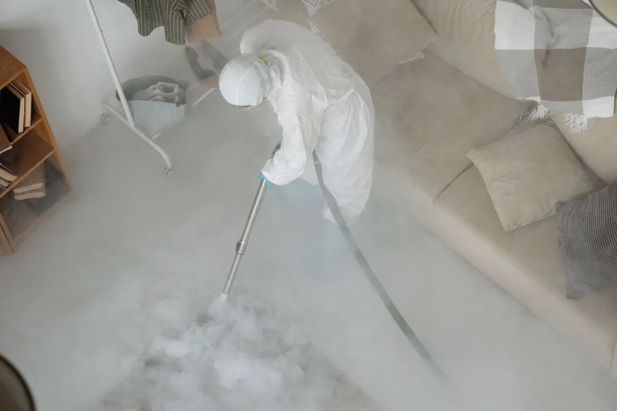 Biohazard cleanup technician in protective equipment, Huntingdon, TN